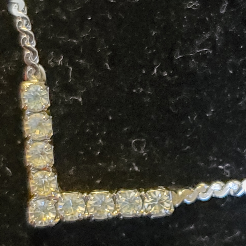 Vintage silvertone necklace with faux diamond V